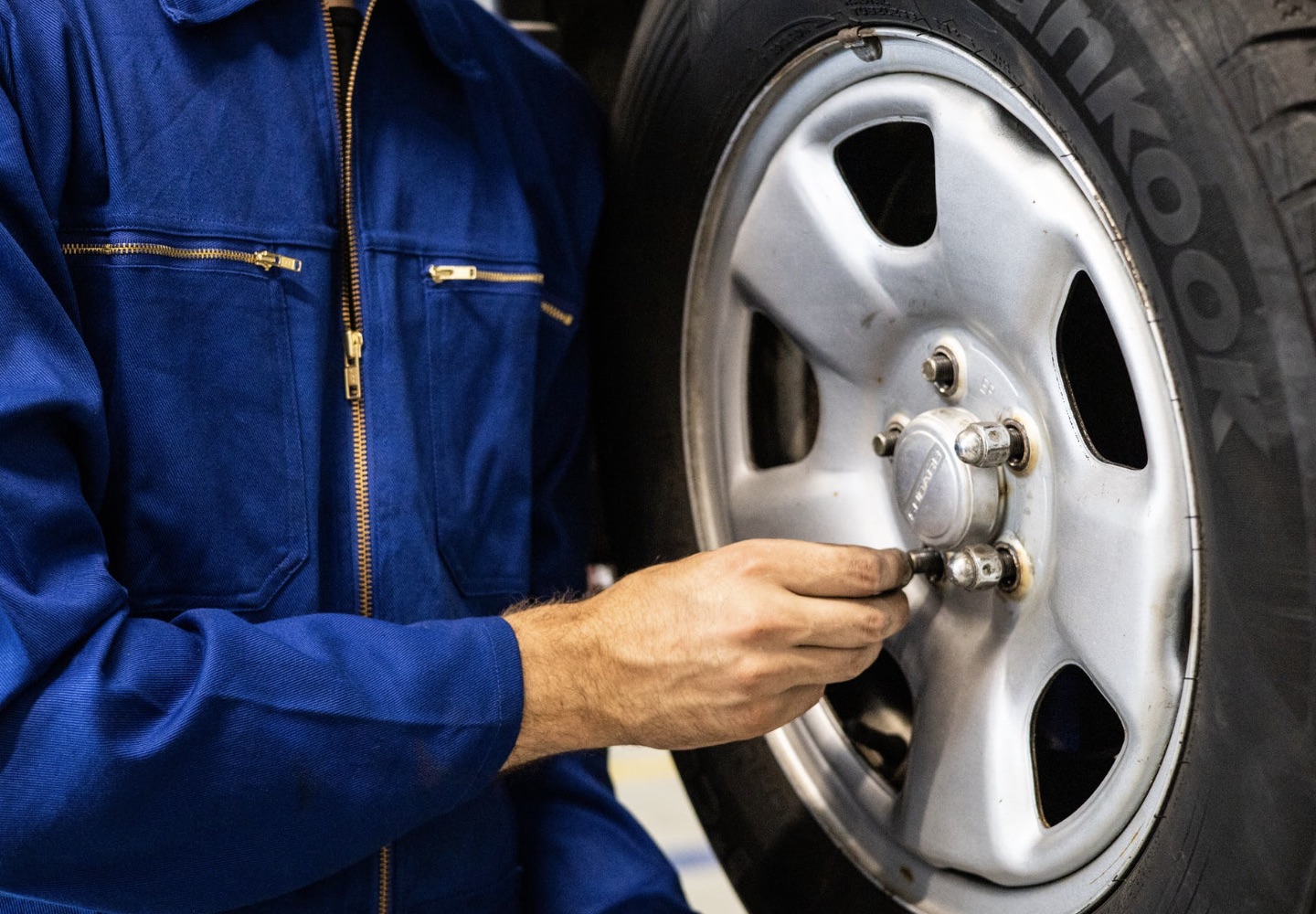 Lou Bachrodt Service repairing a tire for a loyal customer