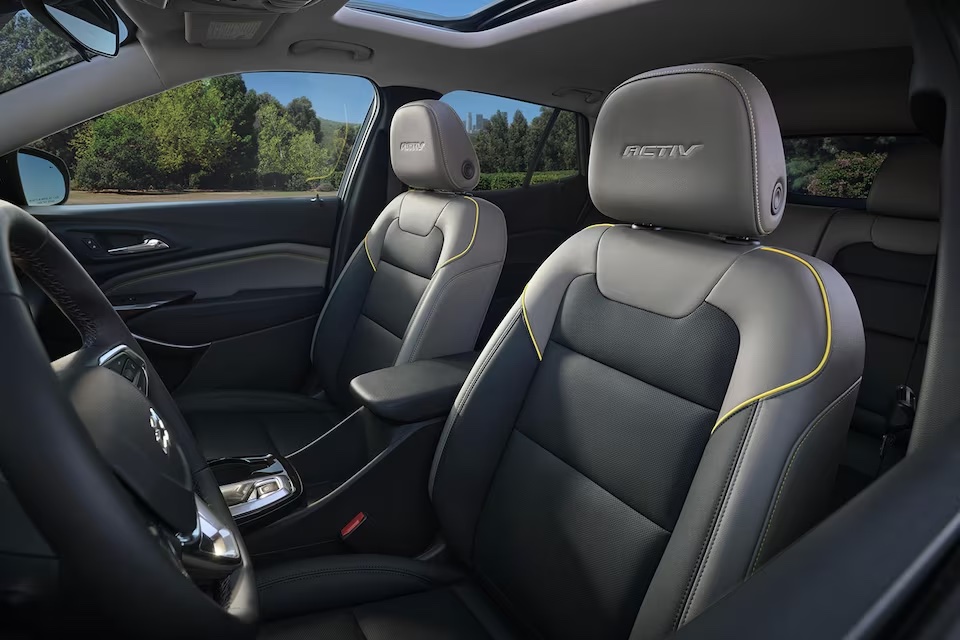 Interior look at 2024 Chevy Trax ACTIV with yellow accents.