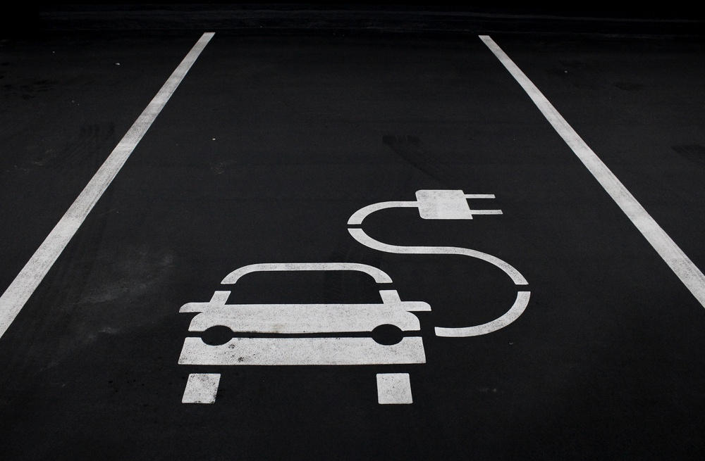 road with charge symbol